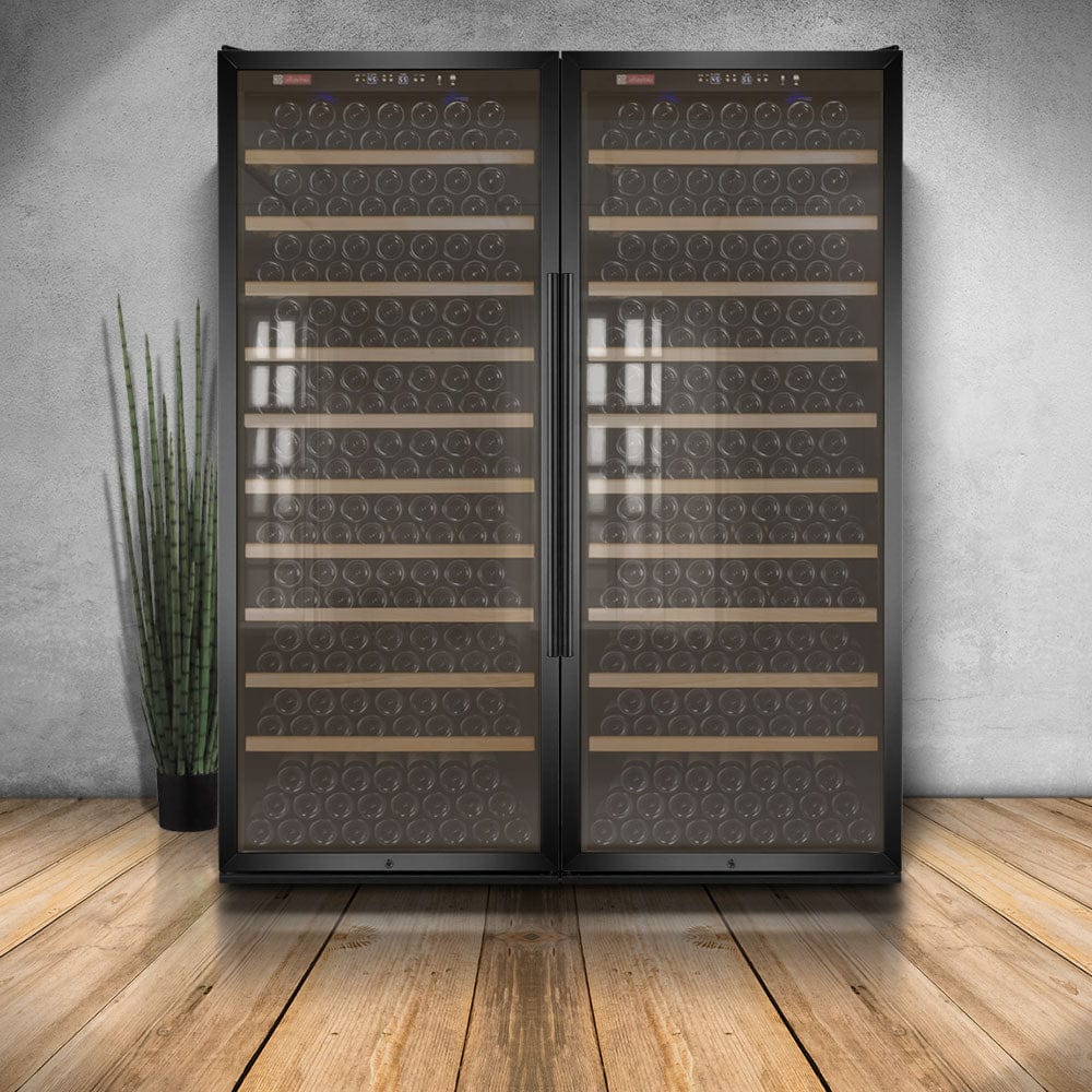 Allavino 554 Bottle Dual Zone 63 Inch Wide Wine Cooler Black Full of Wine Bottles Front View Door Closed in Lifestyle Setup