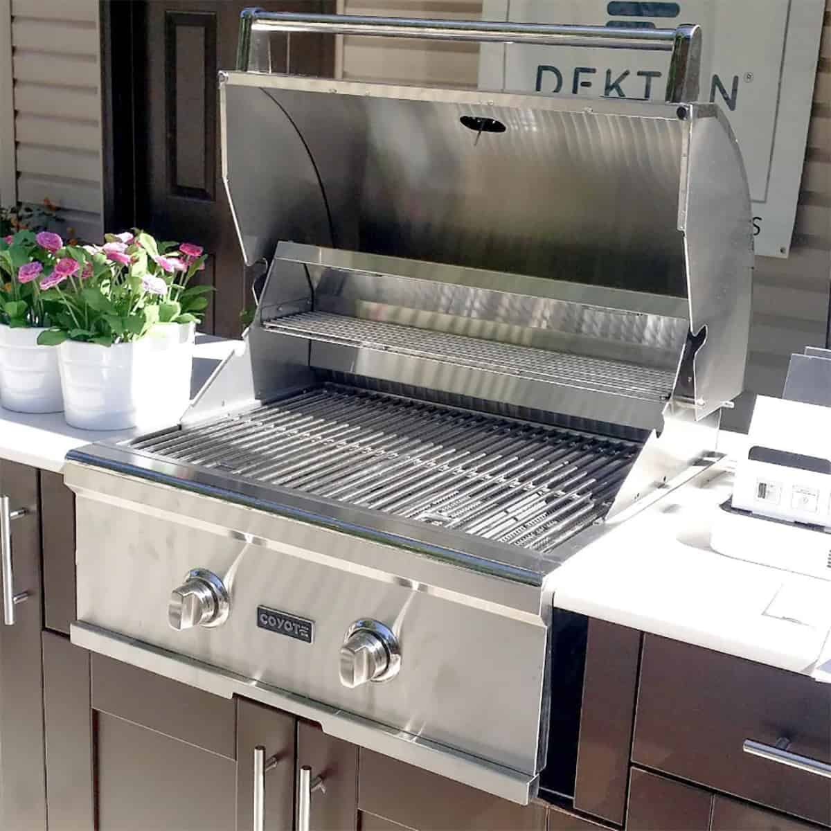 Coyote C-Series 28 Inch Built-In 2-Burner Grill Stainless Built into Kitchen  Open Cover