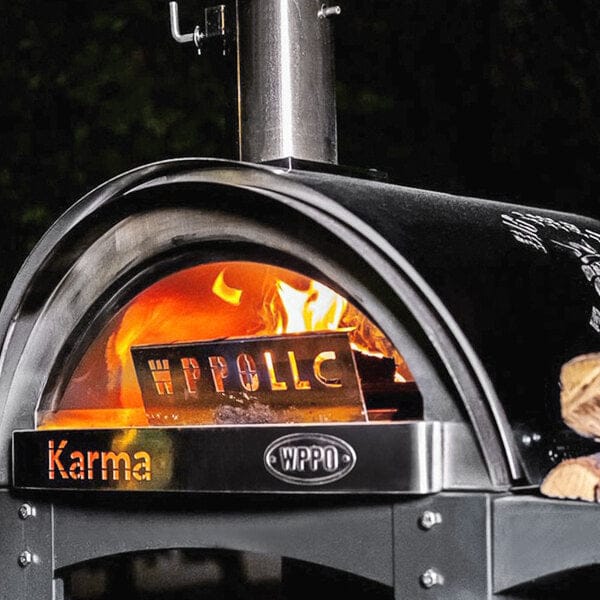 WPPO Karma 25 Inch Stainless Steel Wood Fired Countertop Pizza Oven view of oven in use with wood fire raging